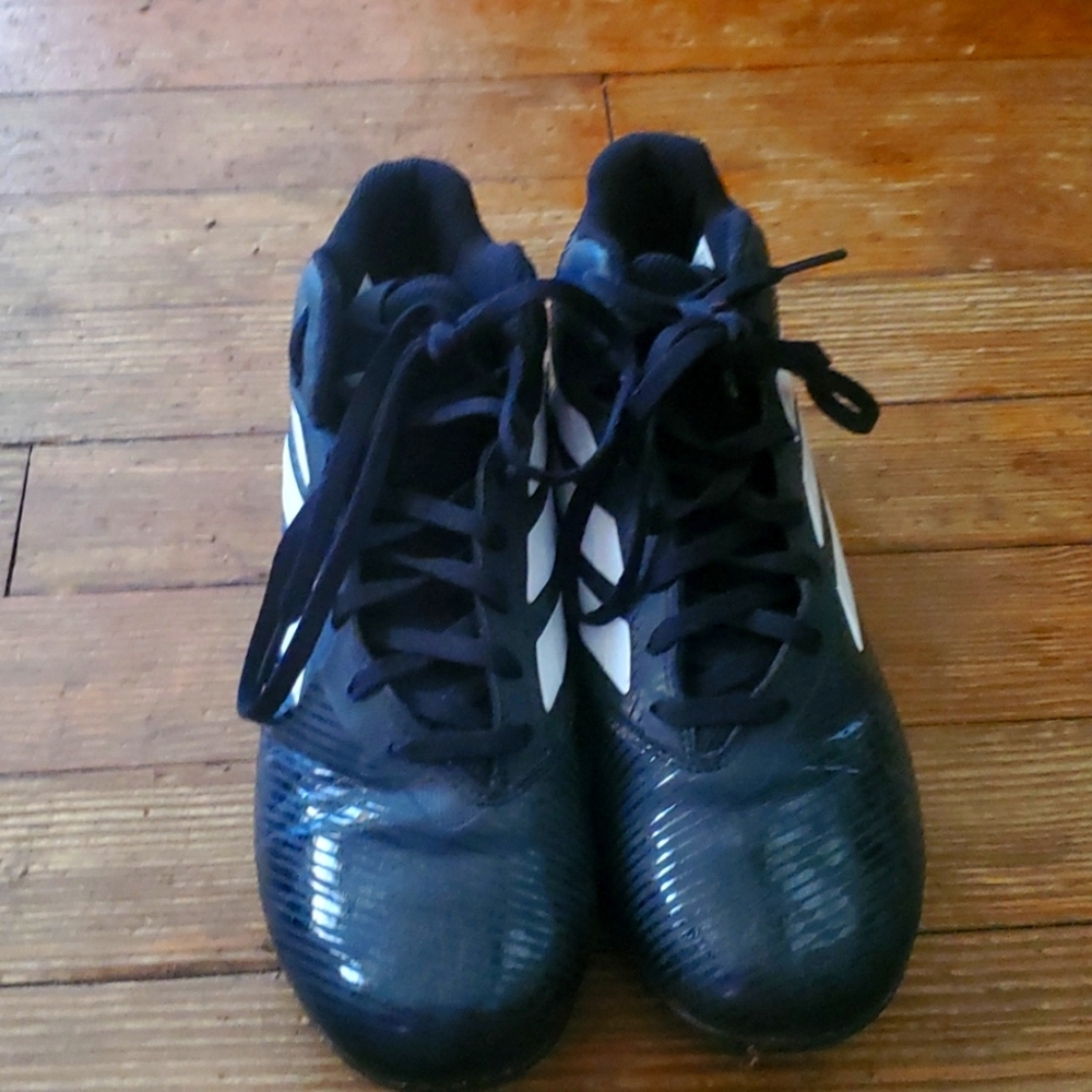 Black addidas fooball cleats for  boys size 4y